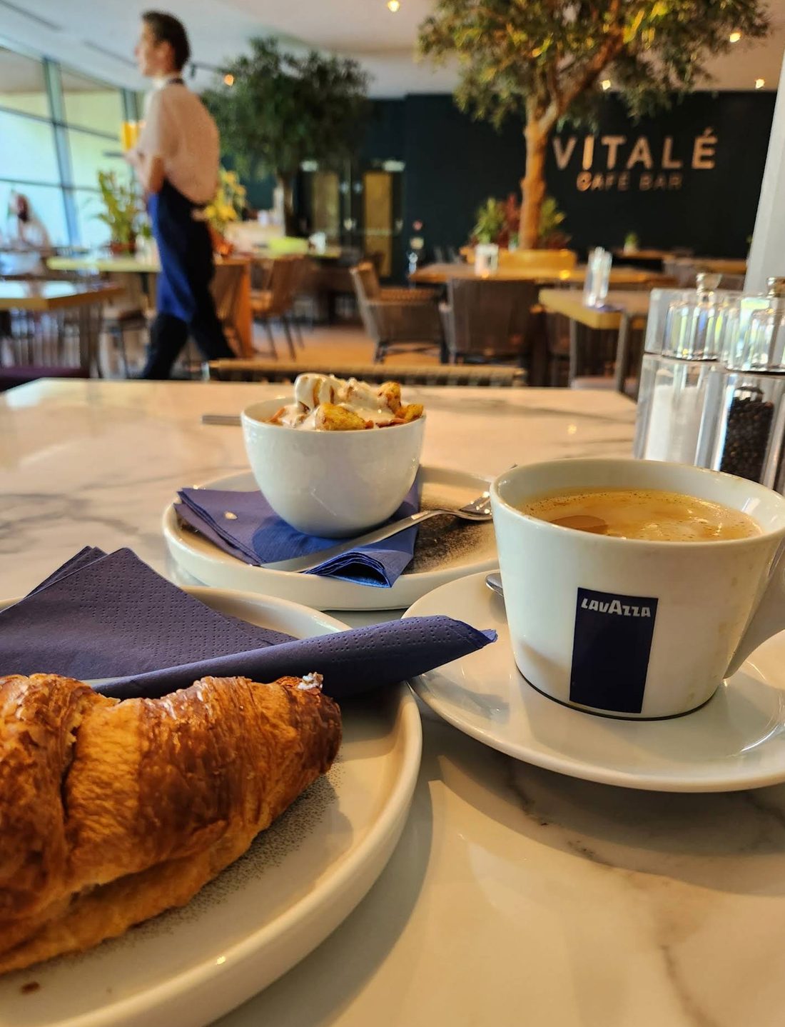 Vitalé Café Bar interior — coffee and pastries